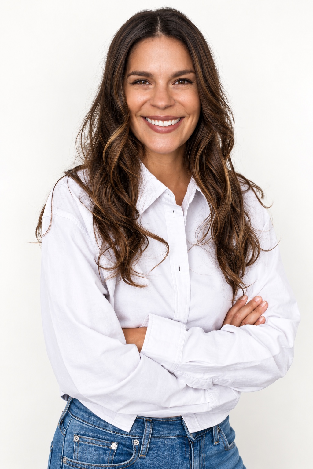 Eva Avila smiling in a white shirt